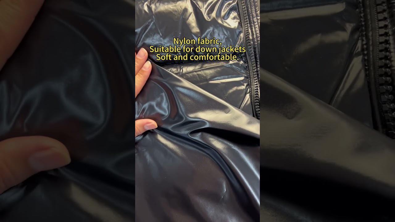 This nylon fabric,ideal for down jacket materials,offers a soft,delicate,and comfortable feel.