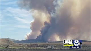 Evacuations issued around brush fire