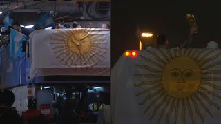 Download Lagu Argentina team bus leaves stadium with Messi lifting World Cup trophy | AFP MP3