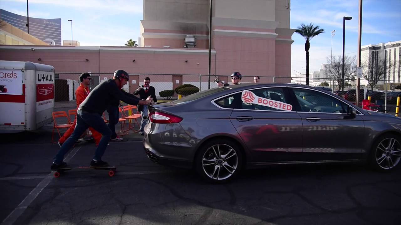 Tony Hawk Pushes Car While On A BOOSTED BOARD!