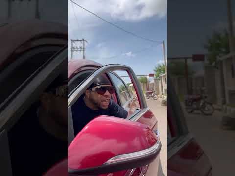 Charles Okocha and Portal bragging in the street.