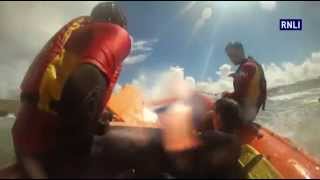 Perranporth Lifeguards rescue three bodyboarders using inshore rescue boat