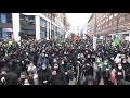 Huge crowd marches through london to mark day of ashura despite social distancing restrictions