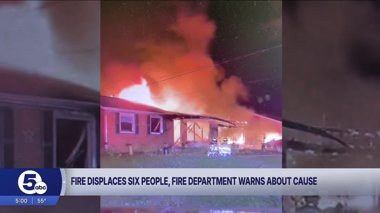 Fire displaces 6 after space heater makes garage go up in flames