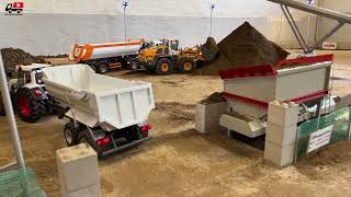 Watch this powerful wheel loader in action at a busy construction site! 🚜🔥
