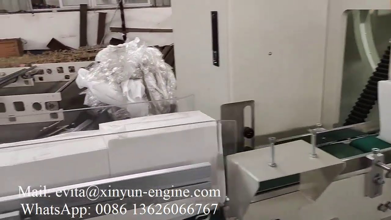 Automatic facial tissue log saw cutting machine