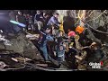 The moment men trapped in a flooded Laos cave emerge after 10 days