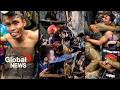 The moment men trapped in a flooded Laos cave emerge after 10 days