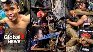 The moment men trapped in a flooded Laos cave emerge after 10 days