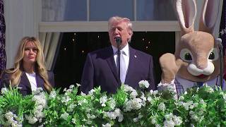 Trump talks about Iran while standing next to Easter Bunny at White House event