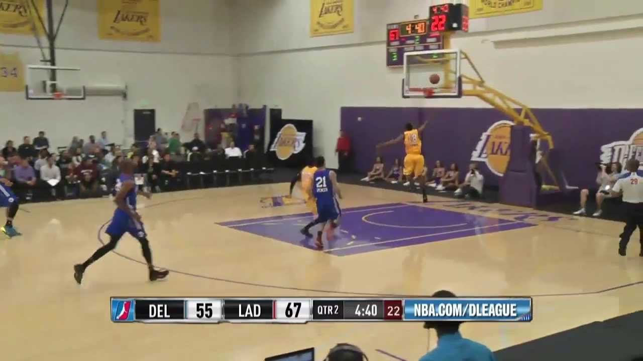Manny Harris dunks off a glass pass by Josiah Turner