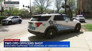2 police officers wounded, 1 critically, in shooting at Chicago hospital, officials say