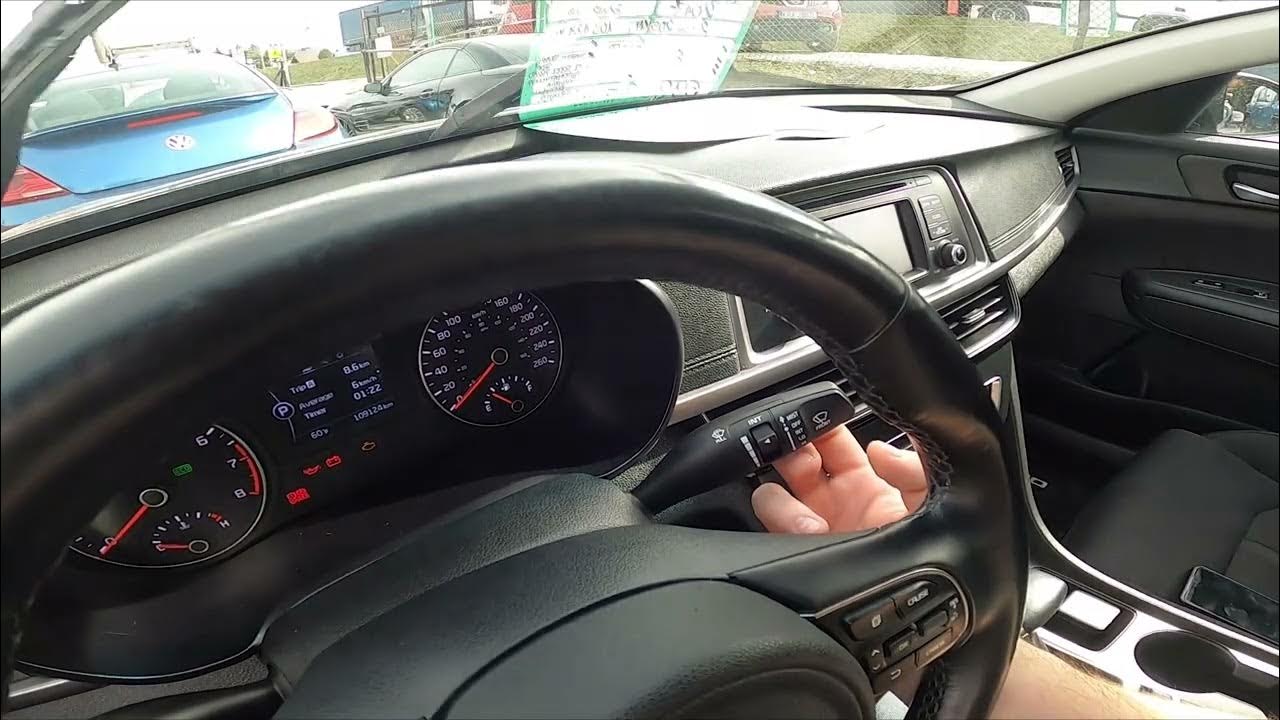 How to Enable or Disable Front Windshield Wipers in Kia Optima II