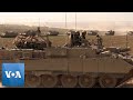 Israeli military vehicles mobilize on gaza border  voa news