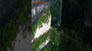 Incredible building! Check out this amazing house built on a cliff in Youshan River Scenic Area