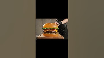 "POV: You cut a burger made of glass 😮‍💨"#googleveo3 #asmr #ai #shorts #viral #glasscutting #burger