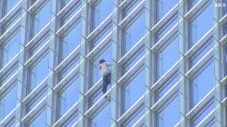 Raw: Man climbs 800foot Devon Tower skyscraper in Oklahoma City