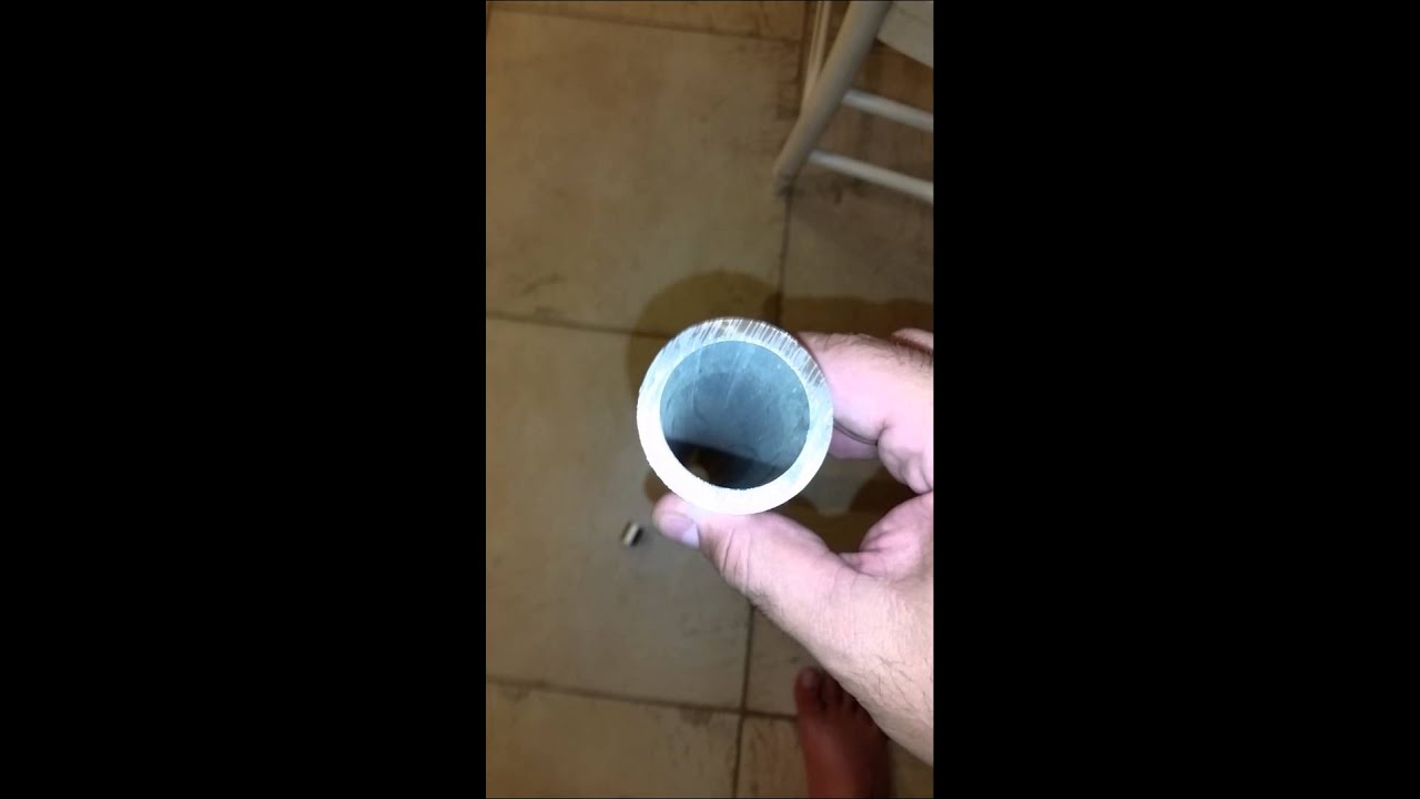 Lenz's Law in action Neodymium dropped through heavy duty