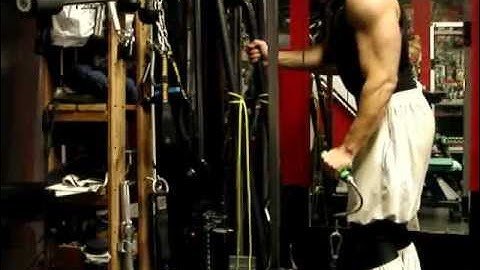 Michael Gundill performs 1 arm cable Reverse curls