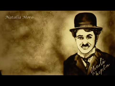 Sand Art by Natalia Moro, "Smile" of Charlie Chaplin. Portrait.