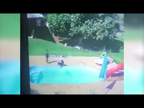 Heroic moment three-year-old boy saves his friend, also three, from drowning in a pool