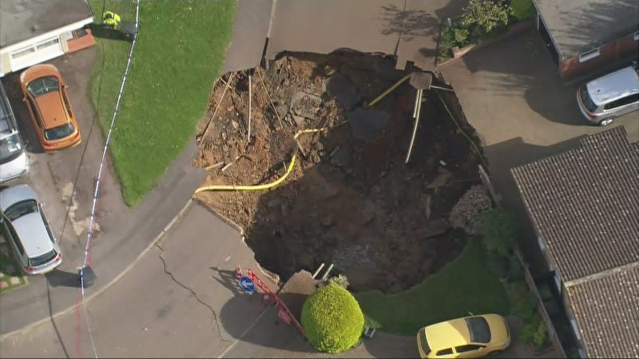 Huge Sinkhole Opens In The Middle Of A Uk Street