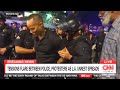CNN reporter DETAINED by riot police, security people ARRESTED on LIVE TV