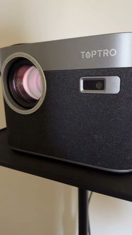 How bright is the TopTro X7 Smart Android Projector during the day