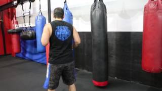 Sensei Ash from Sensei Ash Martial Arts in Tarzana, Ca teaching you the "Back Kick"