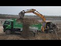 HYUNDAI POWER: Heavy Excavator Loading Sand in Farmlands