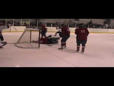 Juneau Douglas High School Varsity Hockey game aga...