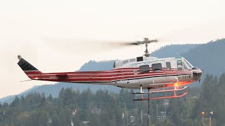 Bell 205 Helicopter Landing
Bell 205 C-FETK of High Terrain Helicopters is seen on the approach and landing at CZNL in Nelson, British Columbia after a wildfire fighting mission carrying a longline and Bambi bucket. This impressive helicopter is always great to see operating out of Nelson. Bell 205 Helicopter Landing
