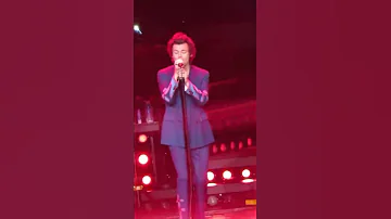 Harry Styles singing "Miss you" by Louis Tomlinson