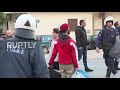 Greece: Riot police clear migrants away from port area back to Moria camp
