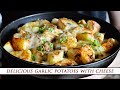 Garlic ROASTED POTATOES with MELTED CHEESE