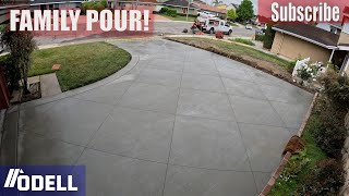 Concrete Driveway pour with a diamond cut pattern and band around the perimeter.