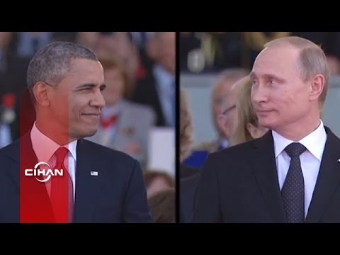 Putin ve Obama'nın göz göze geldiği ilginç an (Perforeli)
