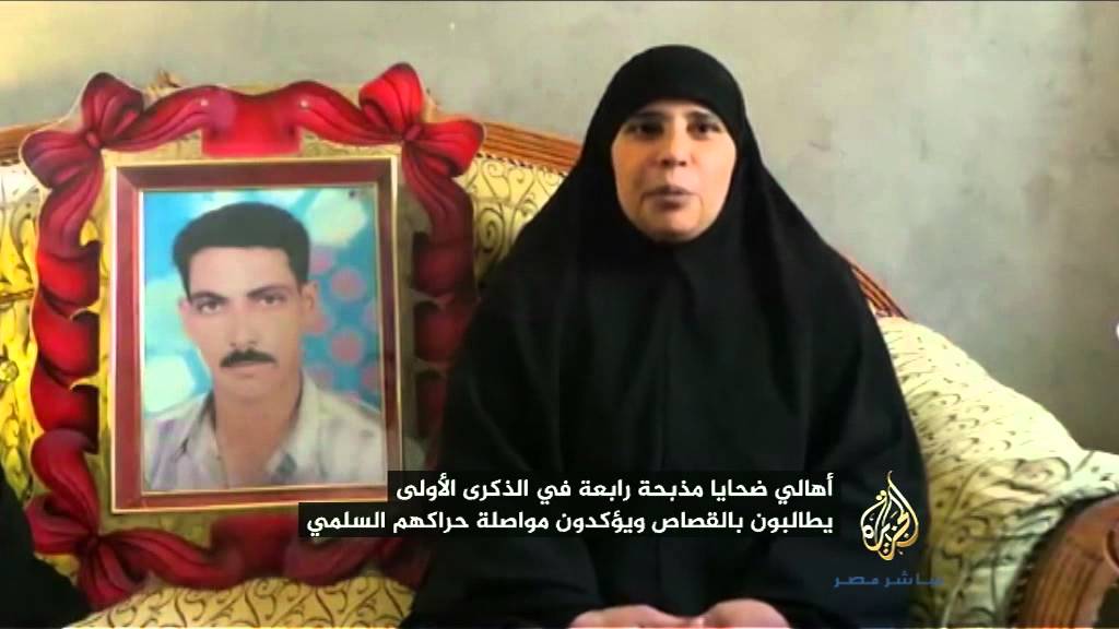 عام على المحرقة.. وأهالي الضحايا يبحثون عن القصاص