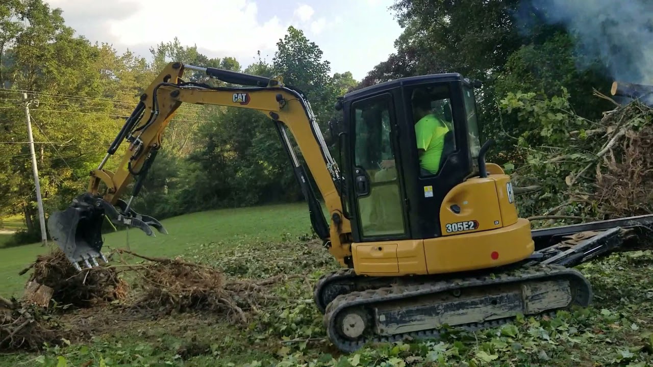 repairing a failed pond dam & installing overflow pipe