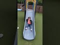 Naby on the slide in longton park toddler slide