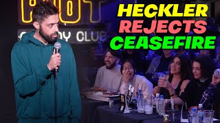 Heckler Rejects CEASEFIRE