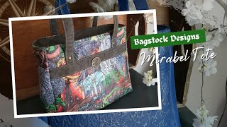 Mirabel Tote-Bagstock Designs Closed captioning (CC)