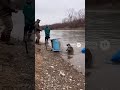 Raccoon Sabotages Fishing Trip with Shopping Cart