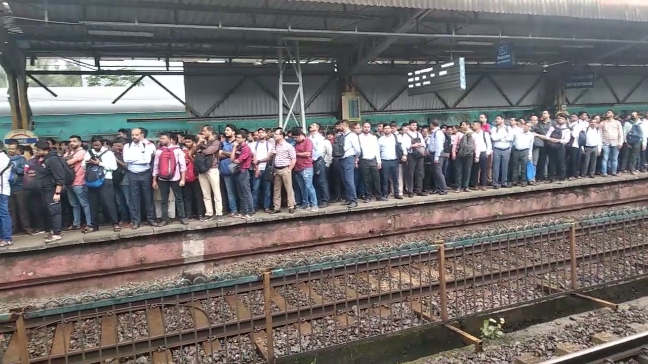 Huge crowd waiting at platform and waiting for local train, Malad station Mumbai
