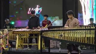 Young Angklung performers playing popular numbers at Udjo Bandung.