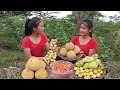 Yummy! Green mango, Santol fruit, Burmese fruit with salt chili for food - Survival in forest