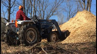 Using the Ford 1700 Tractor to Fill a Soft Spot with Wood Chips screenshot 5