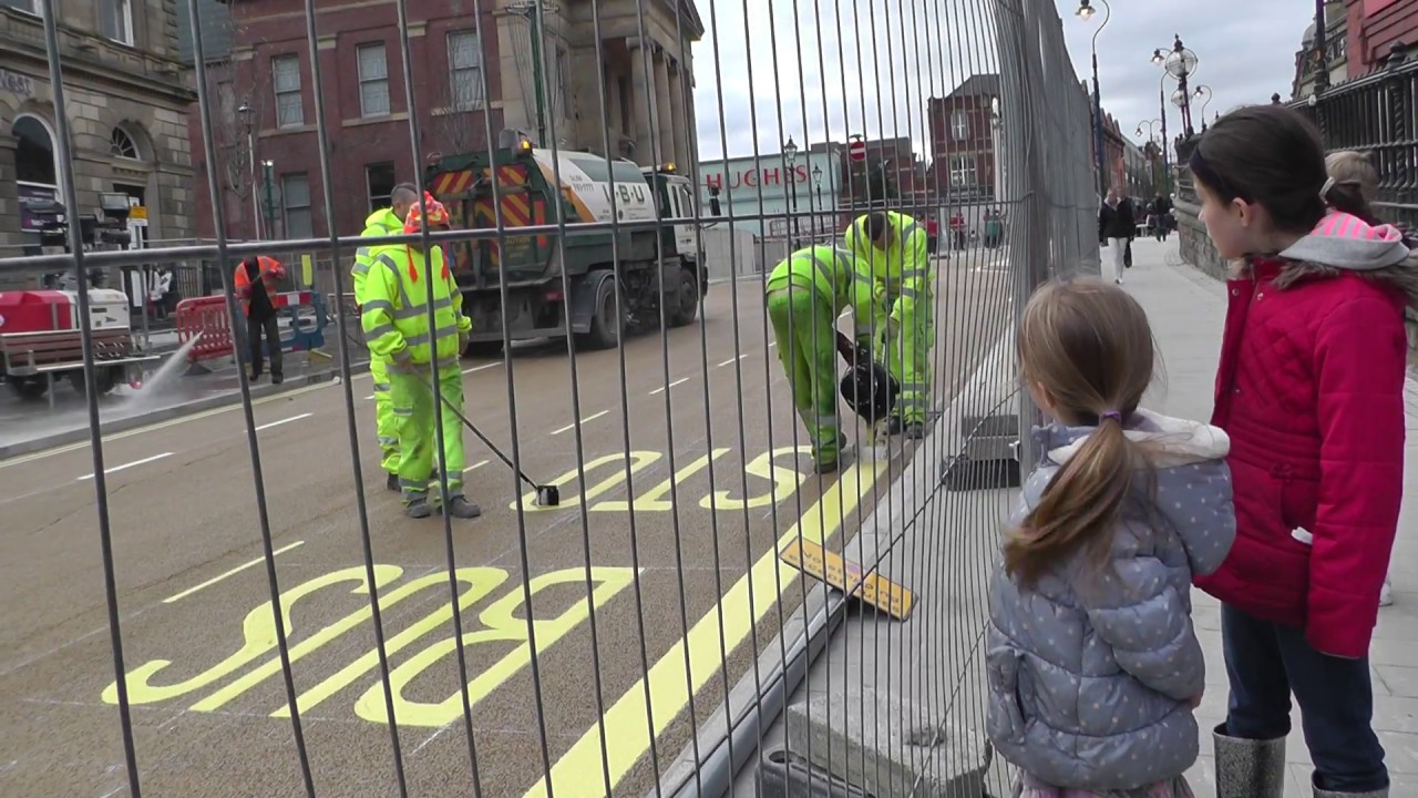 Yellow lines being painted on the road. Very exciting. YouTube
