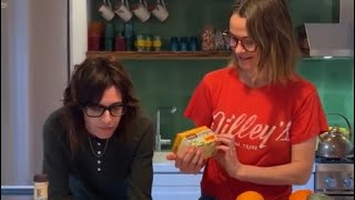 kate and leisha making a singular hot toddy because leisha only has one tea bag