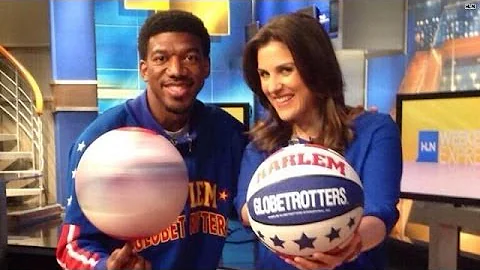 Lynn Berry hoops with a Harlem Globetrotter!